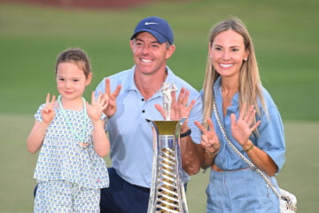 Rory poses with his Daughter, Poppy and Wife, Erica,(Photo by Ross Kinnaird/Getty Images)