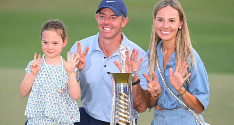 Rory poses with his Daughter, Poppy and Wife, Erica,(Photo by Ross Kinnaird/Getty Images)