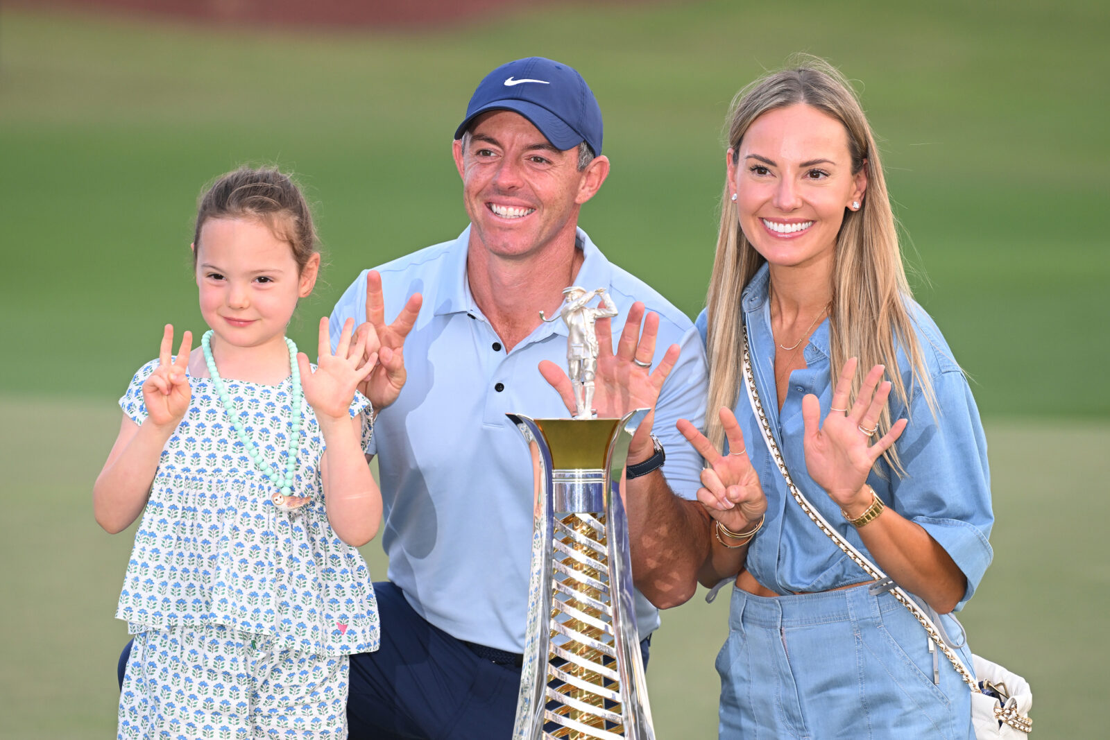 Rory poses with his Daughter, Poppy and Wife, Erica,(Photo by Ross Kinnaird/Getty Images)