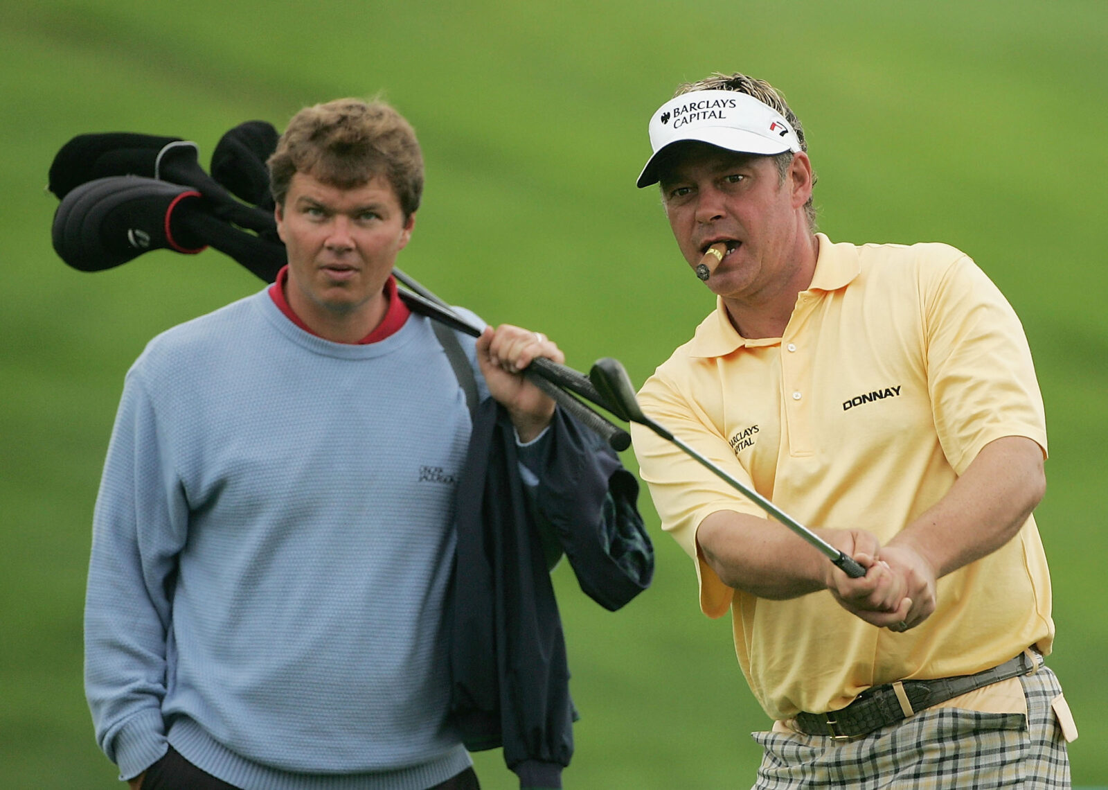 SIMON HOLMES KEEPS A WATCHFUL EYE ON DARREN CLARKE 